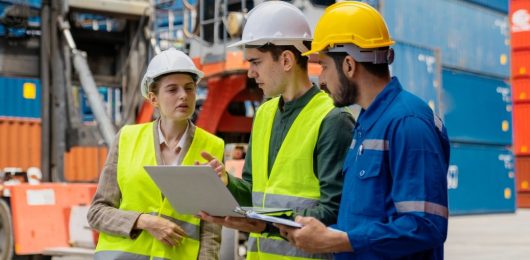 foreman-are-discussing-for-stack-container-at-cargo-site-logistics-service-transportation-.jpg